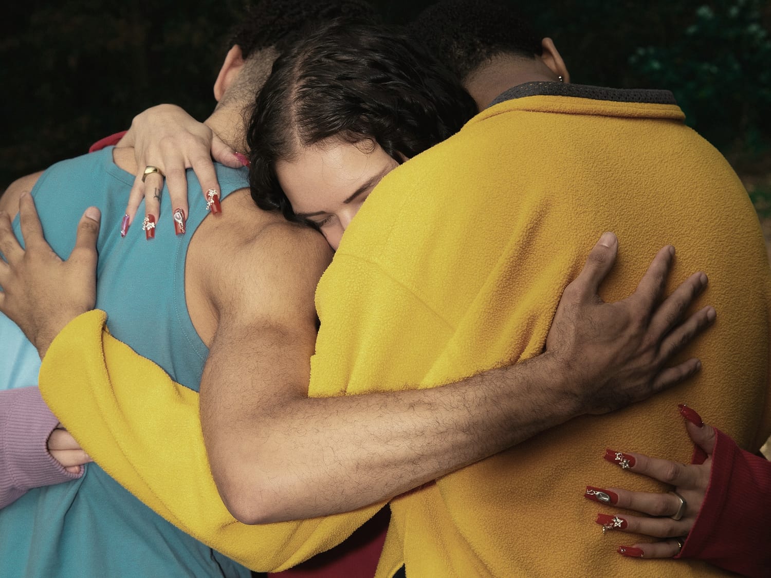 Two people holding each other in a long hug
